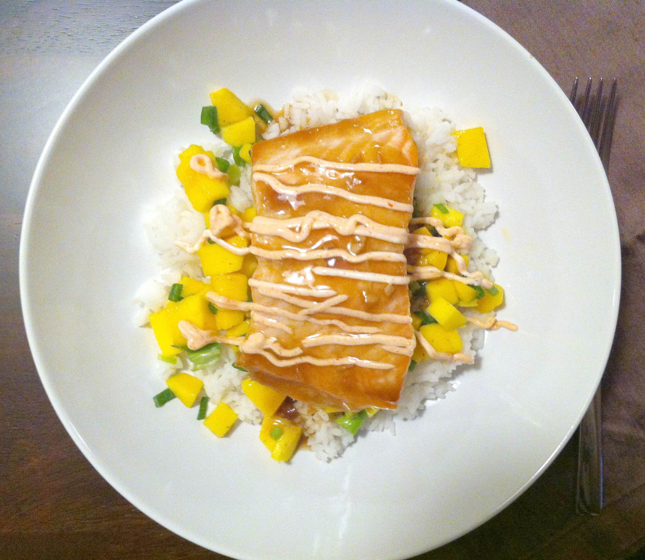 Salmon with Teriyaki Glaze, Mango Salsa, and Siracha Yogurt Sauce