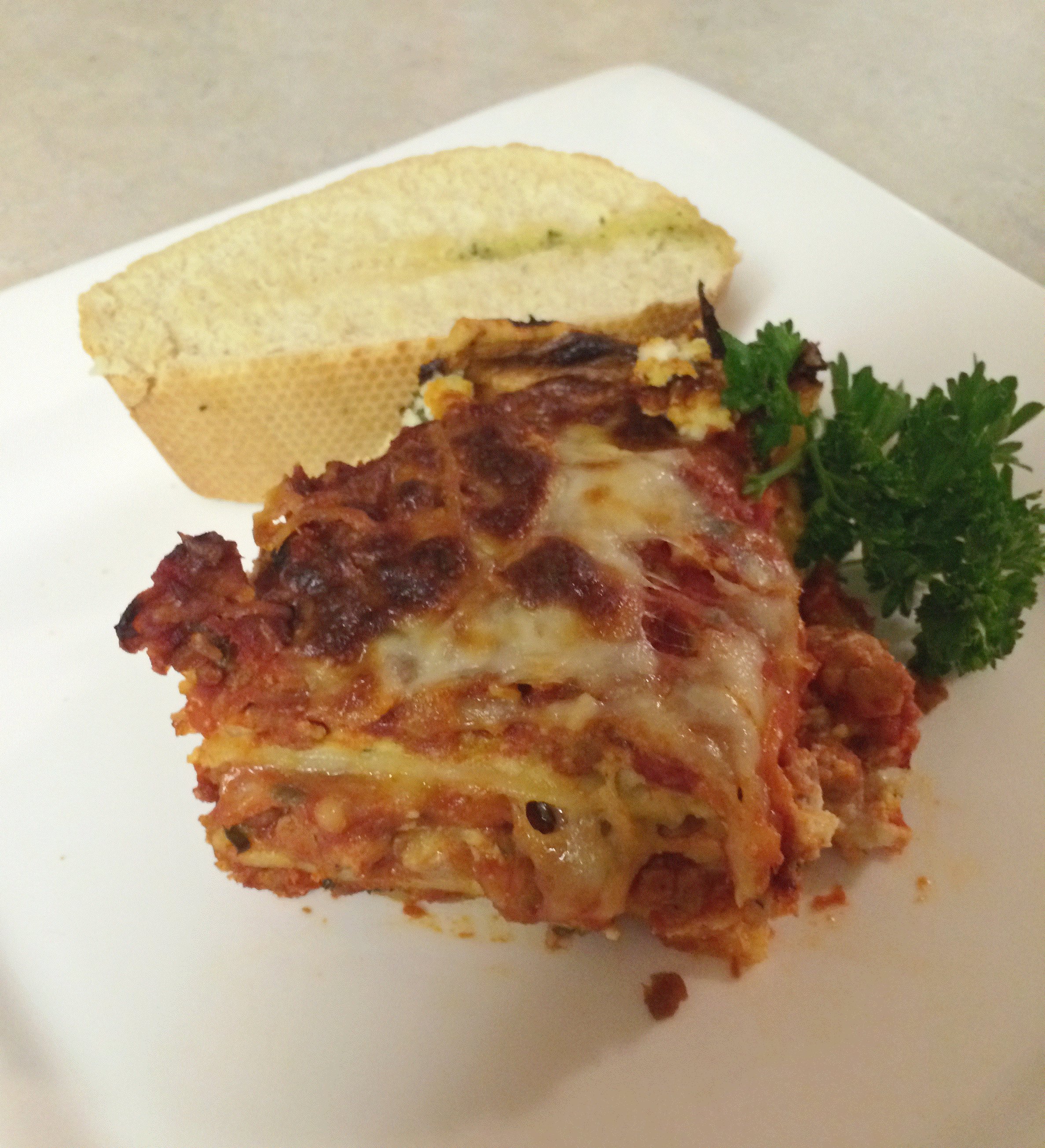 Four Cheese Lasagna with Spicy Italian Sausage