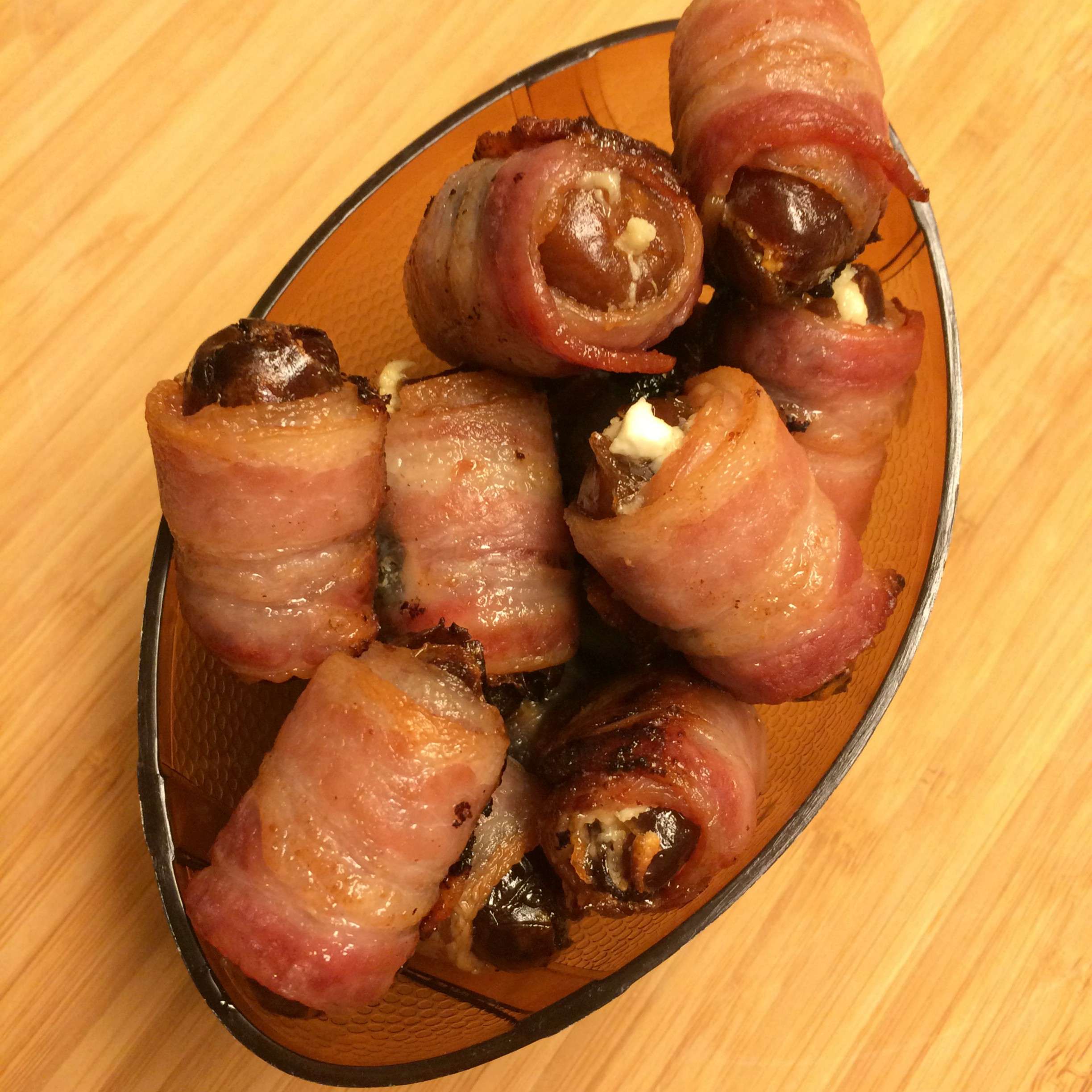 Bacon wrapped dates with goat cheese and almonds the sisters kitchen
